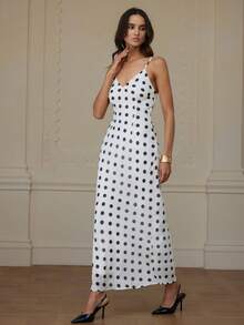 Revavyn 优雅波点雪纺深V领无袖连衣裙，适合工作和日常穿着。 - 黑與白 - 查看 1