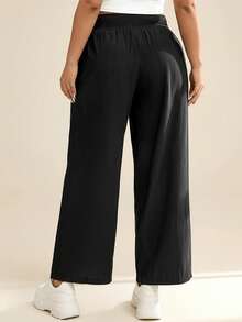 SHEIN Essnce Quần nữ cỡ lớn mùa hè và thu dáng rộng thoải mái, có túi, cạp chun, ống lửng, có túi, quần nữ, quần áo mùa thu, quần giáo viên, quần áo đi học, quần cho người có thân hình đầy đặn. - màu đen - Xem 3