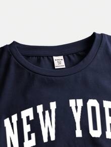 Girlism Áo thun ngắn tay cổ tròn ôm dáng thoải mái cho bé gái tuổi teen, có bèo nhún bên hông và dây buộc tóc. - Màu xanh hải quân - Xem 6