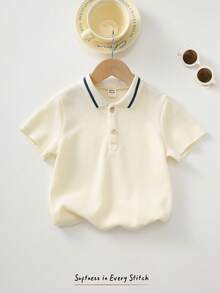 Cozy Pixies 男童纹理罗纹针织柔软翻领半拉链短袖 Polo 衫