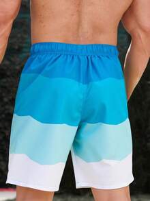 青少年男孩休闲宽松泳衣，蓝色波浪拼布印花沙滩短裤，适合夏季