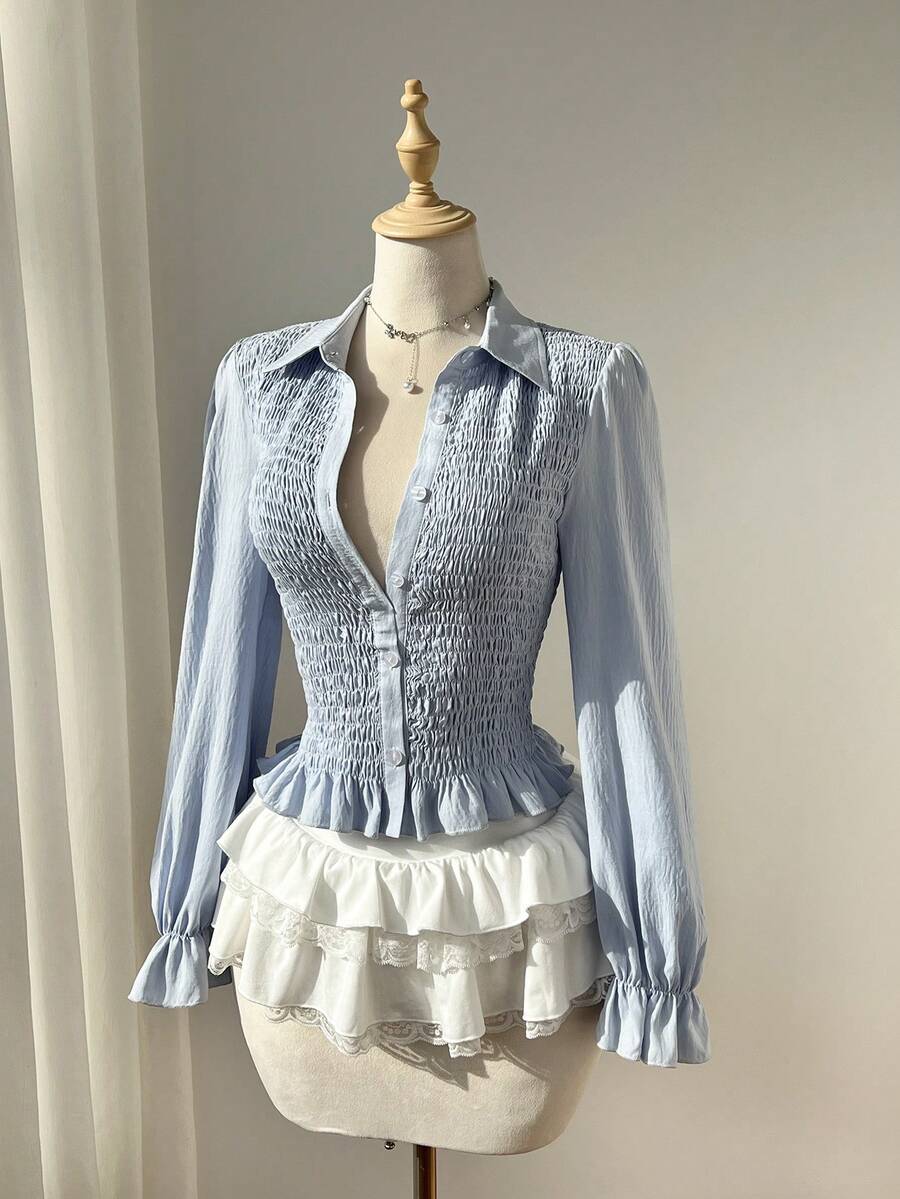 Elamini 女士蓝色弹力褶皱设计小翻领纽扣不对称荷叶边下摆衬衫，甜美浪漫的欧式/法式风格，适合春夏穿着