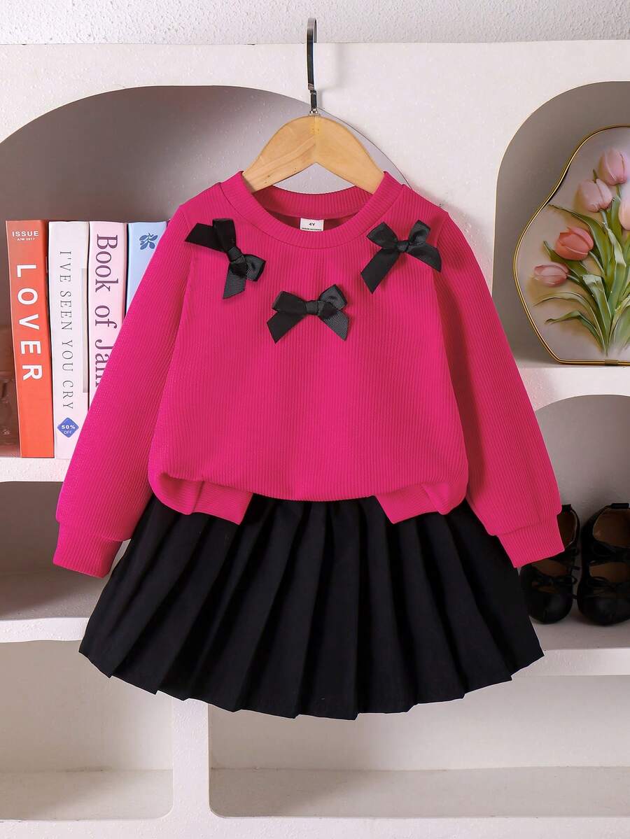 SHEIN Elladie kids 两件套女童休闲可爱针织卫衣套装,长袖蝴蝶结上衣搭配黑色百褶裙,适合秋季、假日和日常穿着。 - 玫紅色 - 查看 1