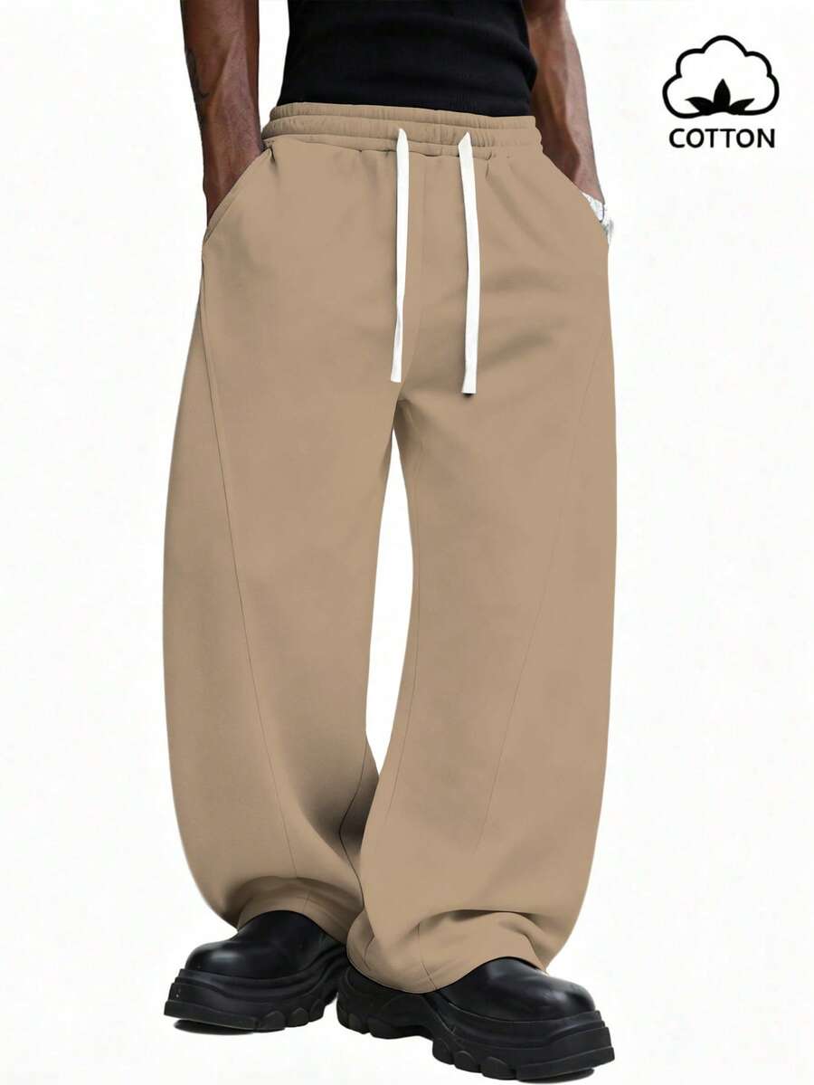 Quần jogger dáng rộng SUMWON với dây rút ở eo và bo chun ở ống quần, chất liệu cotton thoải mái, kiểu dáng trơn. - Lạc đà - Xem 1