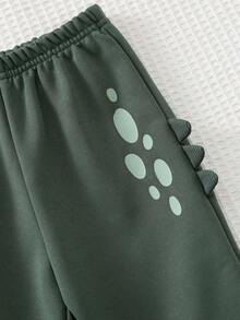 Cozy Pixies Conjunto de 2 piezas de top de manga corta de cuello redondo suave con estampado de dinosaurio de dibujos animados y pantalones de cintura elástica para bebé niño - Verde - Ver 6