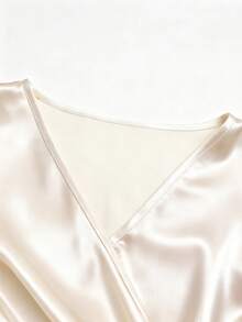 GlowEve Camisa larga elegante de mujer con mangas largas y botones metálicos decorativos, de tela brillante, para otoño/invierno