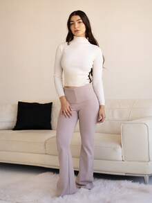 Andrea Bello Pantalones de punto con cintura alta, efecto pitillo y campana para mujer, de estilo minimalista para uso diario y estar en casa, color albaricoque - Caqui - Ver 1