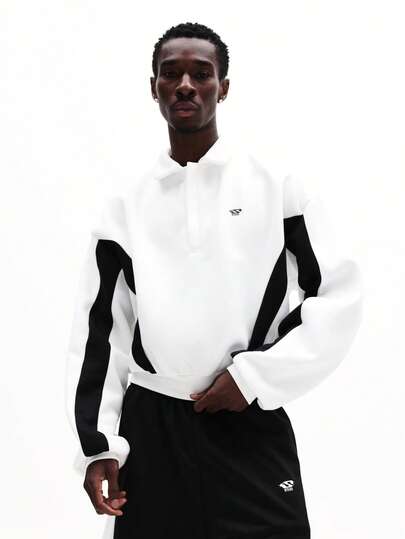 SUMWON Poloshirt met lange mouwen en contrasterende panelen aan de zijkant, normale pasvorm en kraag.