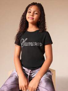 SUMWON Camiseta de cuello redondo de manga corta con texto glamoroso y adornos de strass, estilo informal para vacaciones, para niñas preadolescentes - Negro - Ver 1