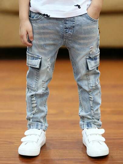 SHEIN Explorewe Pantalones cargo de mezclilla ajustados, con múltiples bolsillos, estilo vintage de calle y efecto desgastado y rasgado para niño