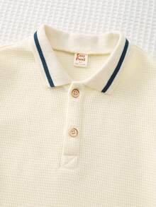 Cozy Pixies 男童纹理罗纹针织柔软翻领半拉链短袖 Polo 衫