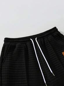 Manfinity Homme Conjunto de chándal casual con sudadera con capucha y pantalones con cordón con diseño gráfico para hombre - Negro - Ver 7