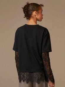 Athîral 女士休闲长袖黑色蕾丝上衣，采用蕾丝饰边设计，黑色蕾丝下摆，舒适柔软的针织面料，宽松版型，黑色上衣，适合女士休闲、度假、外出、生日、嘉年华、春季等场合穿着。 - 黑色 - 查看 2