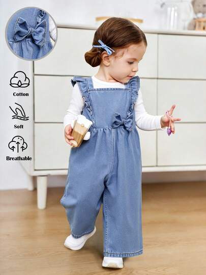 Mono de pierna ancha con volantes y lazo en los hombros para bebé niña en azul denim