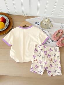 奶油色可爱甜美蝴蝶结印花“爸爸的小公主”女宝宝休闲宽松圆领短袖T恤和修身短裤套装，夏季穿搭，舒适百搭，适合秋季叠穿，时尚百搭，休闲风格，女宝宝图案服装，返校季，秋季服装 - 彩色 - 查看 2