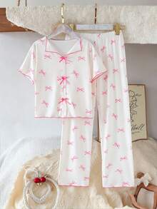 少女睡衣套装，上衣带有领子和蝴蝶结装饰，搭配休闲裤，采用舒适的牛奶丝面料，印有蝴蝶图案，可爱又优雅。 - 杏色 - 查看 1