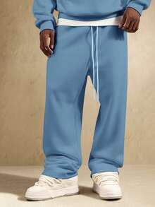 SUMWON 男士运动裤，黑色宽松版型 | 街头风 | INS 必备 | 休闲舒适 | 假日必备单品，这款黑色宽松版型运动裤采用优质面料制成，舒适透气，可轻松搭配任何运动或休闲服饰。简约设计使其成为各种场合的理想之选。 - 霧霾藍 - 查看 4