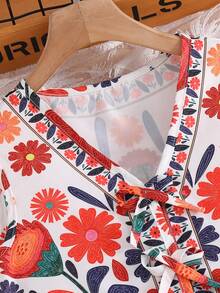 夏季女童大码两件套：这款无袖背心采用精致多彩的花卉印花，与配套的飘逸阔腿裤完美搭配。轻盈舒适的面料，加上醒目的印花，营造出浓郁的热带度假风情。非常适合海滩度假、假日休闲漫步或日常外出穿着。 - 彩色 - 查看 4