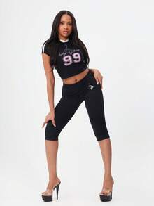 BABYPHAT 印花高腰七分紧身裤，饰有品牌标志和粉色点缀，舒适的七分运动裤，适合日常休闲穿着。 - 黑色 - 查看 2