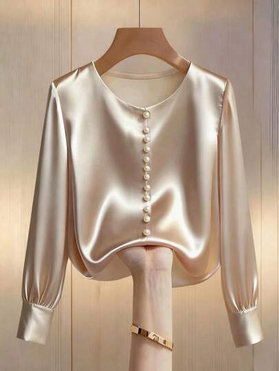 Franclia Women's Champagne-Colored Elegant Round Neck Long-Sleeved Blouse With Pearl Embellishments. Features A Single Row Of Pearl Details And A Satin Satin Fabric. Suitable For Commuting And Everyday Elegant Style.Winter For Women,Christmas,New Year ,White For New Year's Eve,Party,Beach,Elegant,Casual,Casual For Women,Romance, Valentine's Day, Dating,Graduation Season Attire, Fashionable Casual Commuter Wear, Business Office Wear, Versatile And Stylish Everyday Casual Wear, Urban Teacher's Professional Attire
