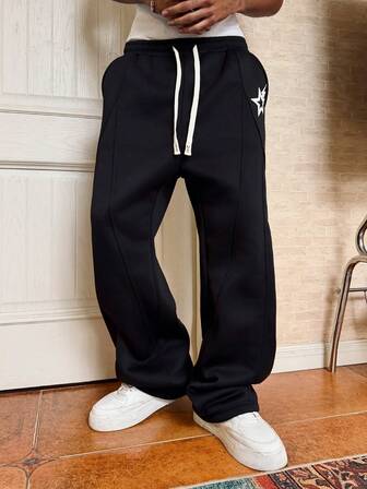 Manfinity Roghcode Calça de moletom masculina folgada com estampa de pentagrama e cordão na cintura.