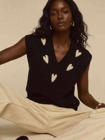 ATUI Studio Blusa holgada de punto sin mangas con cuello en V para mujer