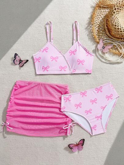 SHEIN Tween Girls Bikini Sets,Girls' Three-Piece Swimsuit Set, Featuring A Cute Bow Print, Including A Bikini Top And Bottom, And A Drawstring Side Skirt. Perfect For Summer Swimming, Vacations, And Beach Wear. A Must-Have Children's Swimwear Set For Summer Holidays. 3pcs Set Bikini With Sarong Skirt Pink Swimsuit 3 Piece Kid Flower Girls Beach Sets Tied Waist Slim Fit Swimwear