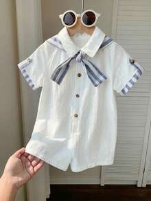 Bộ áo liền quần ngắn tay màu trơn kiểu sinh viên cho bé trai/bé gái, có cổ áo choàng và quần short, thích hợp mặc trong nhà và ngoài trời, phù hợp cho mùa xuân/hè. - Nhiều màu - Xem 6