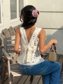 Serisse Áo tank top không tay hở lưng màu trơn dành cho nữ, có nơ rỗng. - Màu be - Xem 7