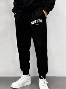 Pantalones de chándal informales con estampado de letras para hombre,Adecuado para todas las estaciones, desplazamientos diarios, actividades al aireentrenamientos de running. - Negro - Ver 1