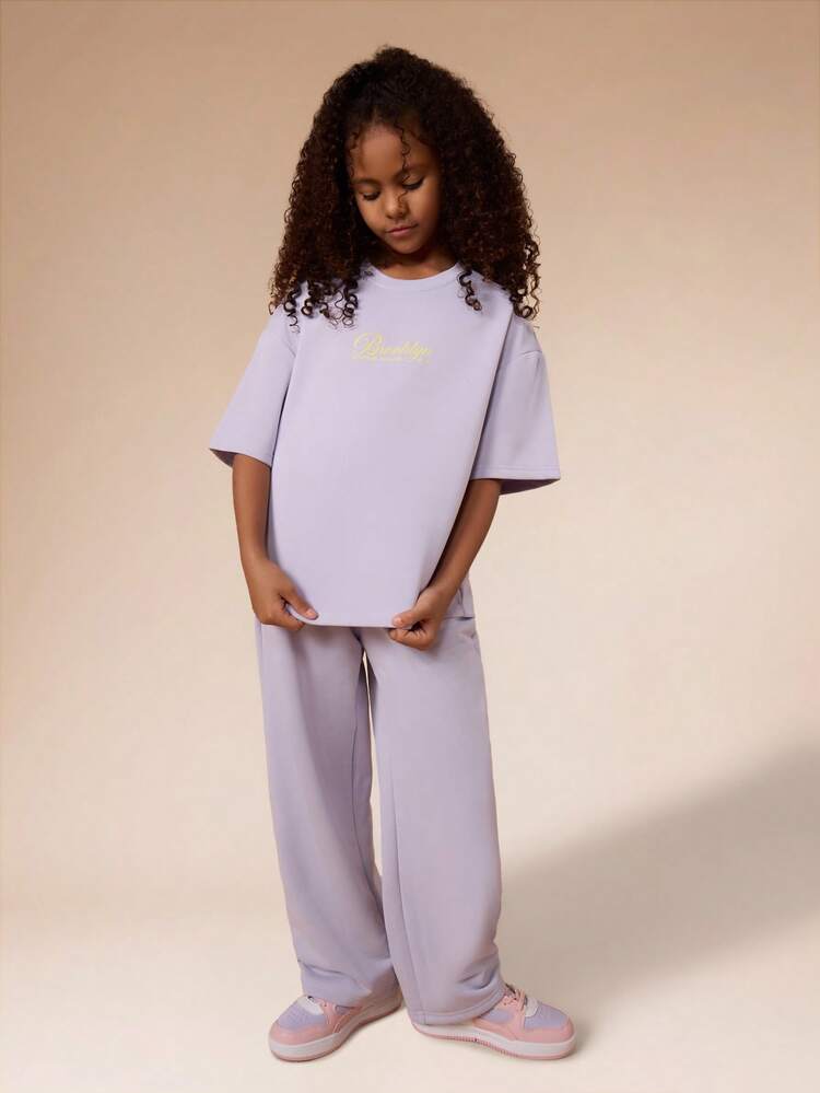 Ensemble t-shirt oversize et jogging avec imprimé script