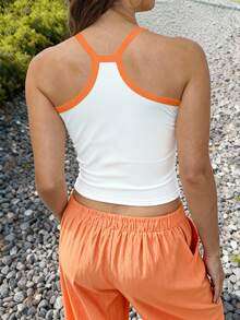 SHEIN Áo croptop không tay dành cho nữ, kiểu Hawaii, thiết kế mùa hè mới, gợi cảm và thời trang, lý tưởng cho các lễ hội, in chữ hình đồ uống và trái cây, màu cam và trắng tương phản, phù hợp cho bãi biển. - Nhiều màu - Xem 2