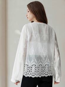 Frievida Intricate Hollow Crochet Embroidered Fabric Deep V-Neck Long Sleeve Blouse - White - View 2