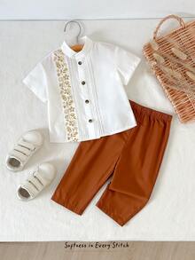 Cozy Pixies Bộ 2 món cho bé trai: áo cardigan tay ngắn họa tiết truyền thống và quần cạp chun. - Nhiều màu - Xem 3