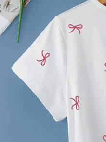 Resyla Women's Summer Short Sleeve Top, New Design With Red Bow Print, White V-Neck, Fashion Versatile, Back To School, Teacher's Day, Ladies T-Shirt - White - View 3