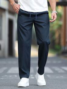 Manfinity CasualCool Men's Solid Color Drawstring Waist Pockets Tapered Casual Pants Men Thin Sweatpants Navy Blue Pants Men Jogger For Men