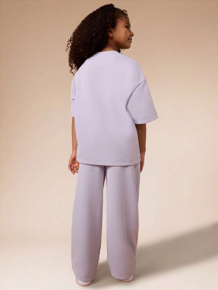 Ensemble t-shirt oversize et jogging avec imprimé script