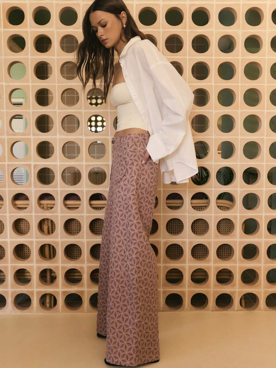 Nöista Wide-Leg Pants In Mauve With A 3d Geometric Quilted Texture. Designed With Rounded Patch Pockets And A Relaxed, Modern Fit. Spring , Spring Break , Spring , Casual , And Vacation Looks. - Dusty Pink - View 1