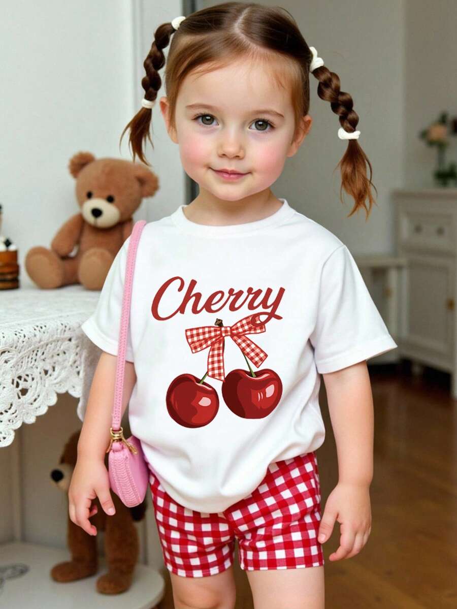 SHEIN Playful Pals 2pcs/Set Baby Girl Outfit, Cute Cherry Print Round Neck Short Sleeve T-Shirt Paired With Red Plaid Print Shorts, Suitable For Outings In Summer - Multicolor - View 1