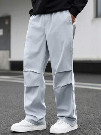 Manfinity Roghcode Pantalones casuales minimalistas para hombres, pantalones de estilo INS de caliente en la calle, pantalones de ajuste amplio, estilo unisex, cintura elástica ajustable, atuendos navideños, regalo de Navidad, regalo diario para novio/esposo, regalo de aniversario, pantalones de color contrastante, pantalones de chándal azules