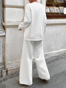 EURMUSE Women Floral Print Round Neck Drop Shoulder Long Sleeve Sweatshirt And Sweatpants Casual Set, Autumn/Winter - White - View 2