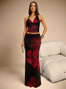Silquee This Two-Piece Set Features A Red Digital Floral Print Knitted Stretch Mesh Top With A Fitted, Droopy Neckline And Metallic Embellishments, A Backless Design, And A Fishtail Skirt. - Black - View 1