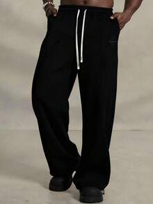 PAVTROS Young Men's Casual Street Style Embroidered Badge Sweatpants - Black - View 3