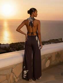 CAJUNI Bộ đồ gồm áo không tay cổ chữ V sâu, thắt eo, in họa tiết lá cây và quần ống rộng thời trang. - màu nâu - Xem 2