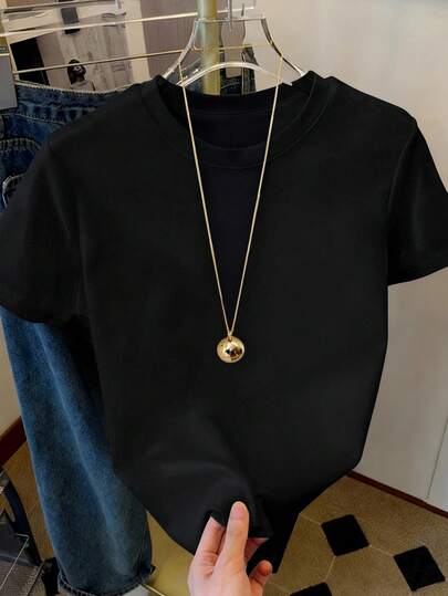 Resyla Damtröja med rund hals och kort ärm, enfärgad och avslappnad, mångsidig pendling