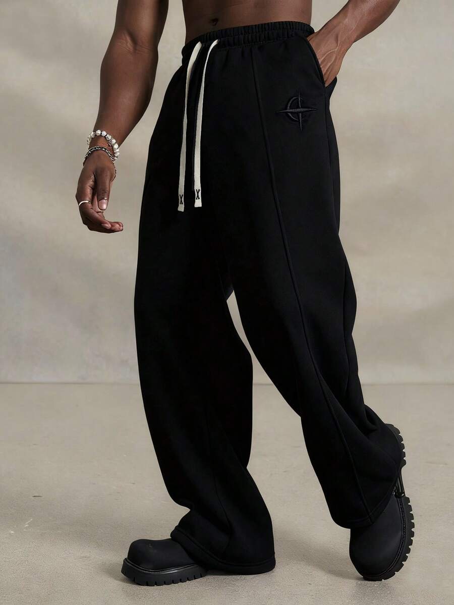 PAVTROS Young Men's Casual Street Style Embroidered Badge Sweatpants - Black - View 1