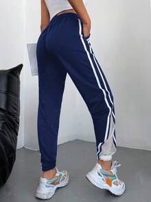 SHEIN Cottnline Spodnie dresowe z 95% bawełny, kontrastową taśmą i ściągaczem w pasie oraz ukośnymi kieszeniami