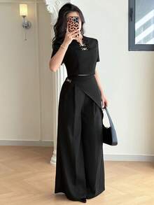 Modelyn Bộ đồ nữ thanh lịch công sở gồm áo tay ngắn và quần ống rộng đính kim loại, thích hợp cho mùa hè. - màu đen - Xem 6