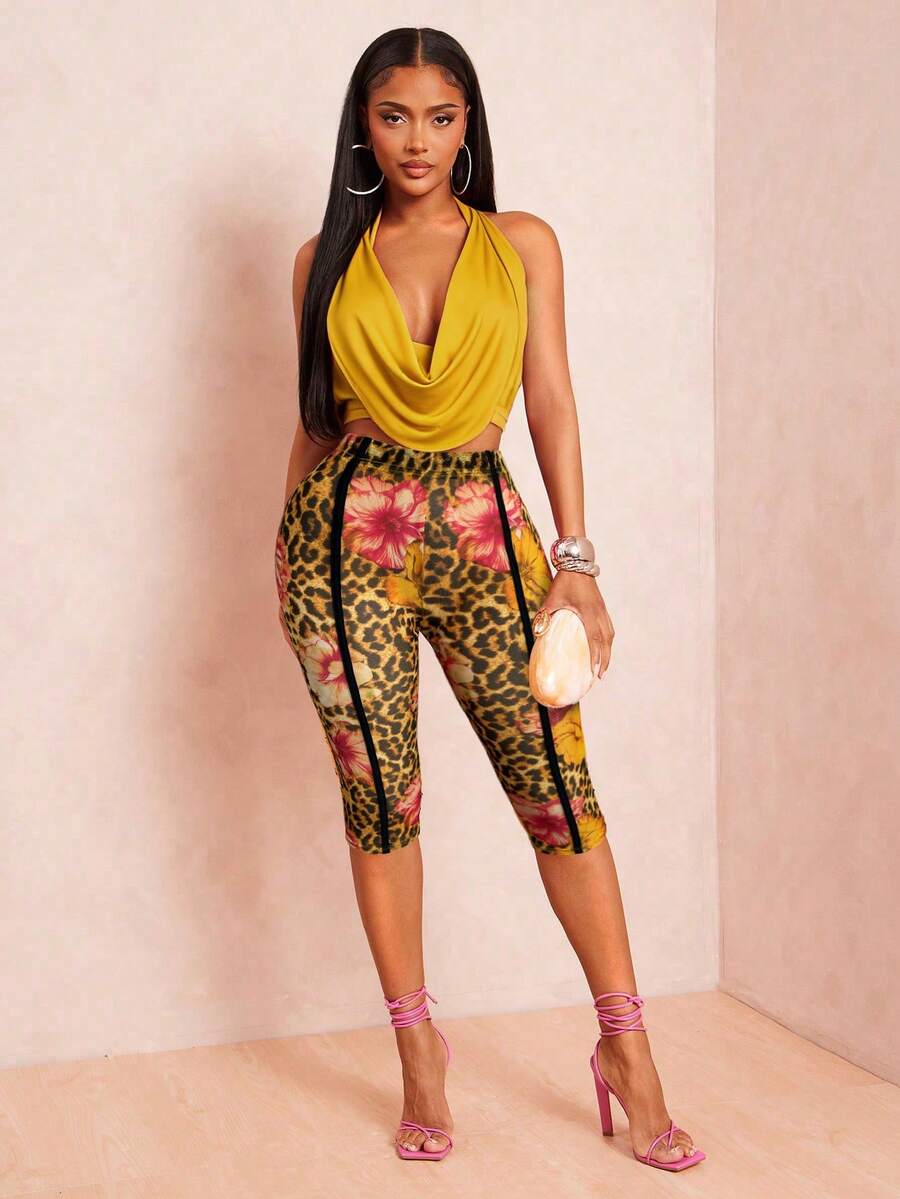 Radiana Bộ 2 món gồm áo croptop không tay cổ xếp ly hở lưng màu vàng mù tạt và quần legging cạp cao dài đến bắp chân họa tiết da báo, phong cách đường phố gợi cảm cho mùa xuân/hè. - Màu Mù tạt vàng - Xem 1