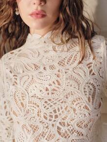 Anewsta Women's Summer Cashew Flower Hollow Out Fitted Knit Top With Slight High Collar And Flared Sleeves - Apricot - View 2